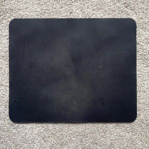 Black mouse pad, and Corsair gaming mouse
